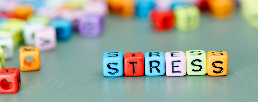 Square colour beads spelling stress